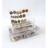Large quantity of costume jewellery including earrings, necklaces, bangles, brooches, etc.