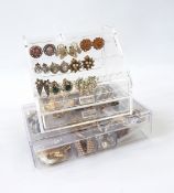 Large quantity of costume jewellery including earrings, necklaces, bangles, brooches, etc.