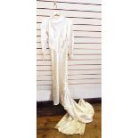 1930's satin wedding dress with long train, pintucked sleeves together with the original veil,