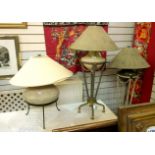 Table lamp of classical vase form, with swags and tripod support in brown and cream,