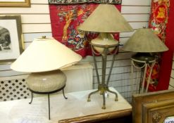 Table lamp of classical vase form, with swags and tripod support in brown and cream,