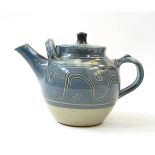 Ray Finch Winchcombe ash glazed teapot with combed and sgraffito decoration through blue slip,