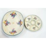 Poole pottery bread dish with hand-painted floral decoration, green dot -effect rim,