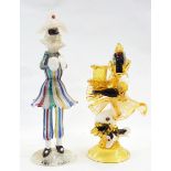 Three latticinio glass figures playing cymbals, banjo,