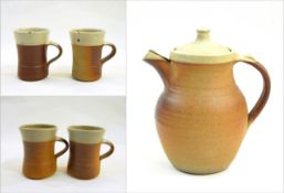Ray Finch Winchcombe wood fired coffee pot and four mugs with cream slip to rims,