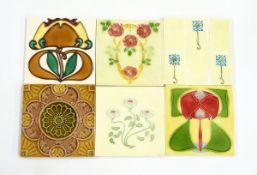 Collection of tiles to include a blue and white floral decorated tile,