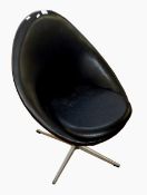 1960's leather revolving chair on single column support and splayed feet