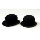 Two bowler hats, a grey Fedora,