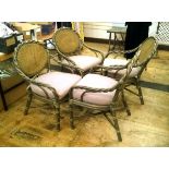 Set of four twisted bentwood open arm chairs by Mc Guire of Canada upholstered seat pads,