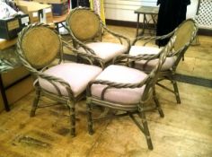 Set of four twisted bentwood open arm chairs by Mc Guire of Canada upholstered seat pads,