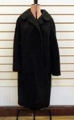 Black astrakhan coat labelled 'Emerson & Co, 74 George Street,