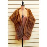 Mink stole with brown satin lining