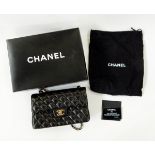 Chanel quilted handbag with brass-coloured metal fittings, stamped inside 'Chanel, Made in France',