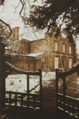 Sepia photograph on canvas View through gates to building, shot on Kodak Professional 35ml.