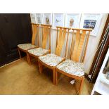 Set of six Ercol serpentine lath back chairs with abstract seat covers,