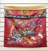 Oriental embroidered silk wall hanging panel, decorated with figures and symbols,