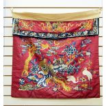 Oriental embroidered silk wall hanging panel, decorated with figures and symbols,