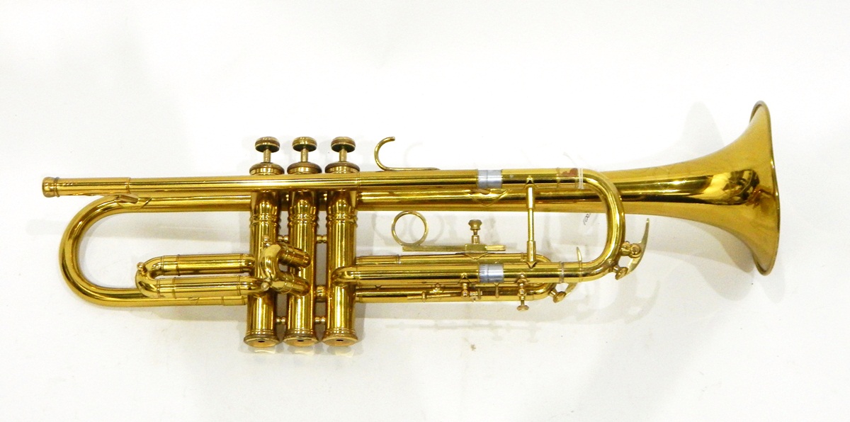 Brass trumpet with engraved decoration,