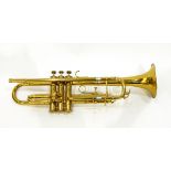 Brass trumpet with engraved decoration,