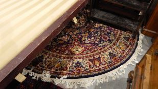 Indian machine-made circular rug of floral design, 200cm diameter approx.