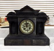 Victorian black slate mantel clock with exposed mechanism, eight-day gong striking,