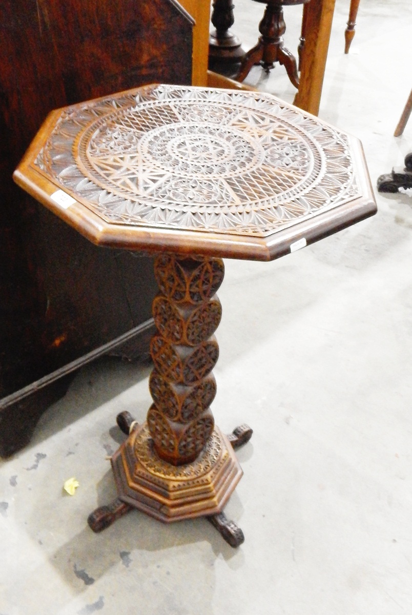 Eastern carved hardwood octagonal top side table on column support, with splayed feet,