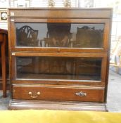 Oak Globe Wernicke style glazed bookcase with pair of shelves, up and over doors, long drawer below,
