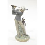 LOT WITHDRAWN Lladro porcelain model of a figure playing golf,