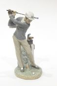 LOT WITHDRAWN Lladro porcelain model of a figure playing golf,