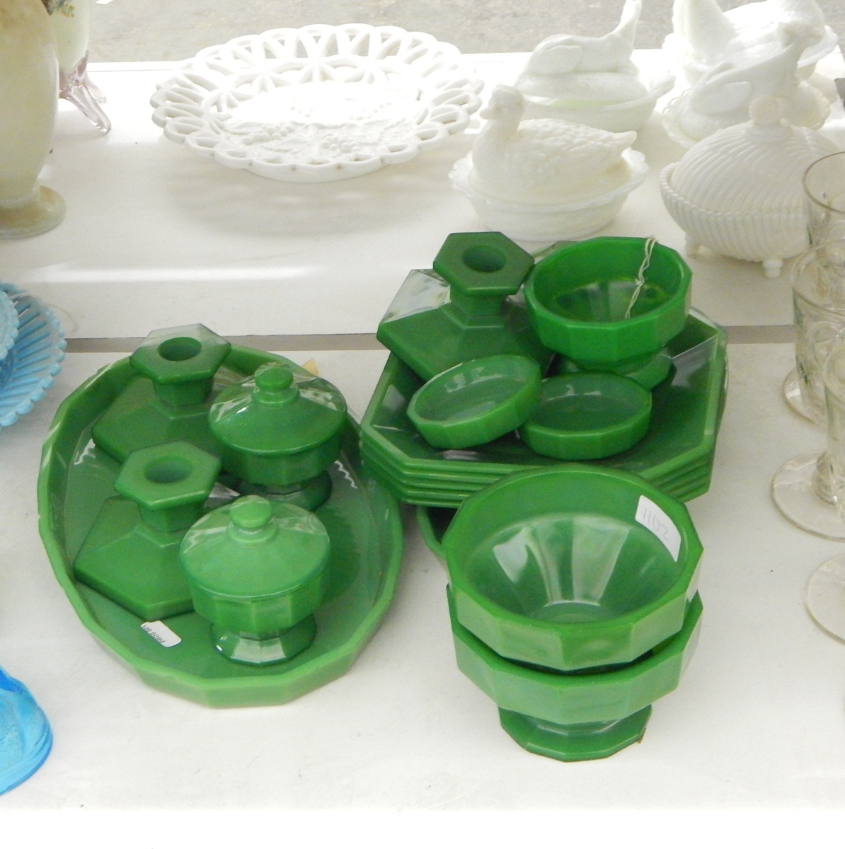 Quantity of early to mid 20th century green pressed glass items including a dressing table set,