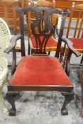 Chippendale-style mahogany open armchair with entwined pierced splat back, upholstered drop-in seat,