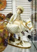 Moore Bros white ground porcelain painted figure of boy on donkey,