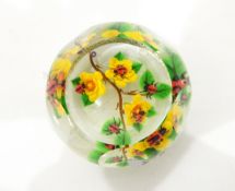 Glass paperweight by John Deacons of circular form with oval faceted viewing windows,