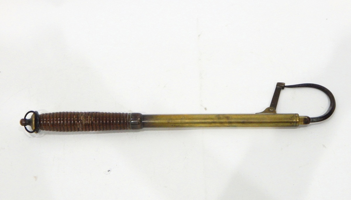 Brass two-draw extending salmon gaff with spring point projector, turned wooden handle,