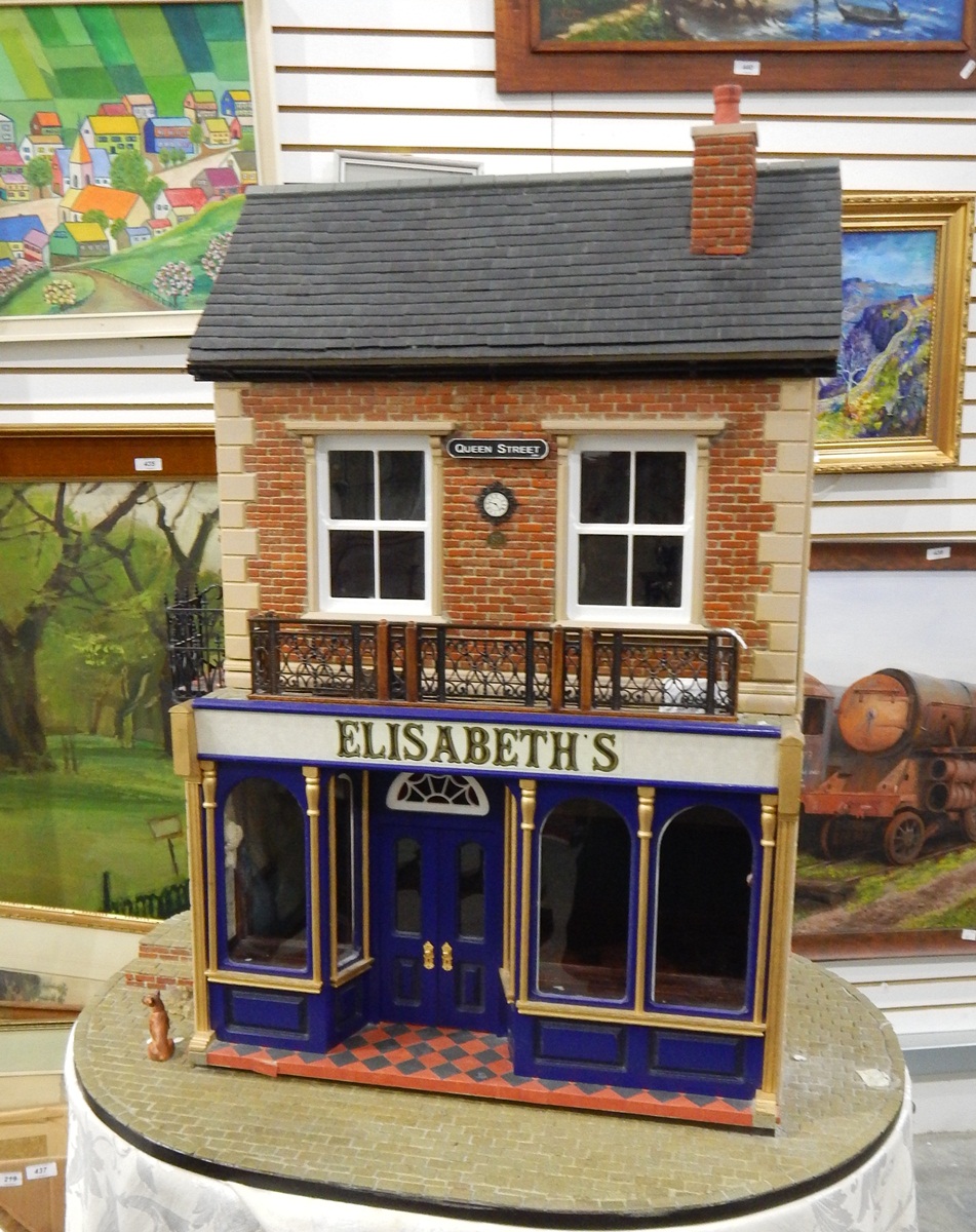 Large doll's house designed as a shop, named 'Elisabeth's,
