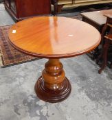 Mahogany circular top side table on turned bulbous pedestal and circular foot,