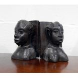 Pair of African carved hardwood busts of women, a pair of bookends, elephant ornaments, etc.