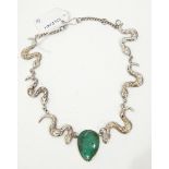 Silver necklace by Fiona Greenwood with central green hardstone pendant flanked by three serpents