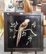 Painted glass and foil painting, the silver and peach foil used to depict a parrot on a branch,