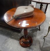 19th century rosewood circular top occasional table, on turned column support with circular foot,