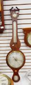 Victorian walnut banjo barometer with broken swan neck pediment over dry/damp circular gauge over