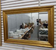 Rectangular bevelled plate wall mirror within a gilt frame and two further wall mirrors (3)