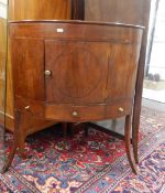19th century mahogany corner washstand with central cupboard and small drawer below,