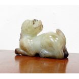 Carved Oriental jade model of a temple dog and a jade child's bangle (cracked) (2)