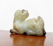 Carved Oriental jade model of a temple dog and a jade child's bangle (cracked) (2)