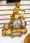 19th century French gilt metal and porcelain mantel clock having Sevres-style and floral painted