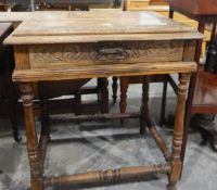 Old oak rectangular topped side table with foliate carved border and moulded edge,