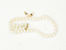 Cultured pearl necklace and a pair similar earrings,