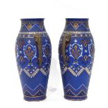 Pair of Mettlach baluster-shaped vases of matt blue ground with incised gilt and enamel