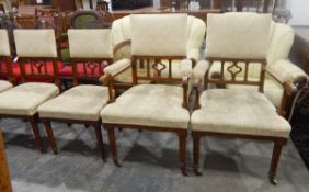 Set of eight oak framed dining chairs with upholstered backs, with spindle supports,